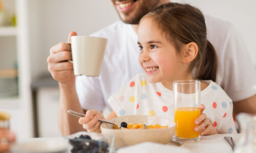 Young child enjoying breakfast